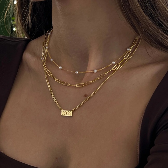 Double Cross Necklaces: A Timeless Trend for the Bold and Fashion-Forward